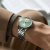 a17327361l1a1-navitimer-automatic-36-on-wrist.png
