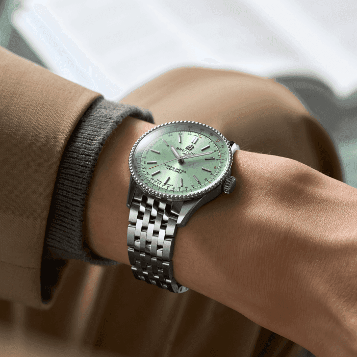 a17327361l1a1-navitimer-automatic-36-on-wrist.png