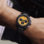 sb0147101i1x2-avenger-b01-chronograph-44-night-mission-on-wrist.png