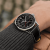 navitimer-41-gmt-a32310251b1p1-black-leather-wrist-shot-ecom.png