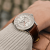 navitimer-41-gmt-a32310211g1p1-white-leather-wrist-shot-ecom.png