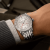 navitimer-41-gmt-a32310211g1a1-white-metal-bracelet-wrist-shot-ecom.png
